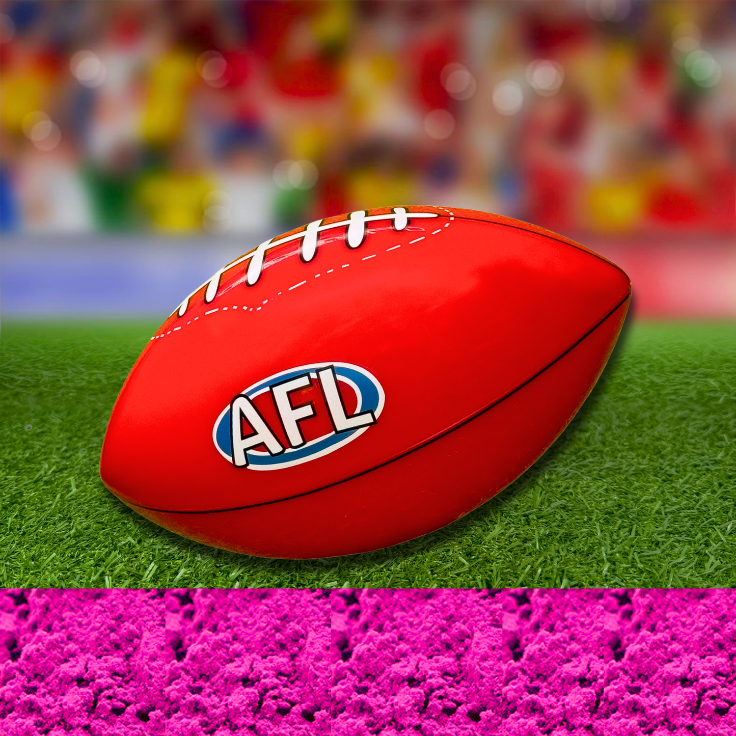 Sports Gender Reveal AFL Ball: Red Australian Football League ball positioned on green turf with bright pink powder effect below, set against a colorful bokeh background, perfect for gender reveal celebrations