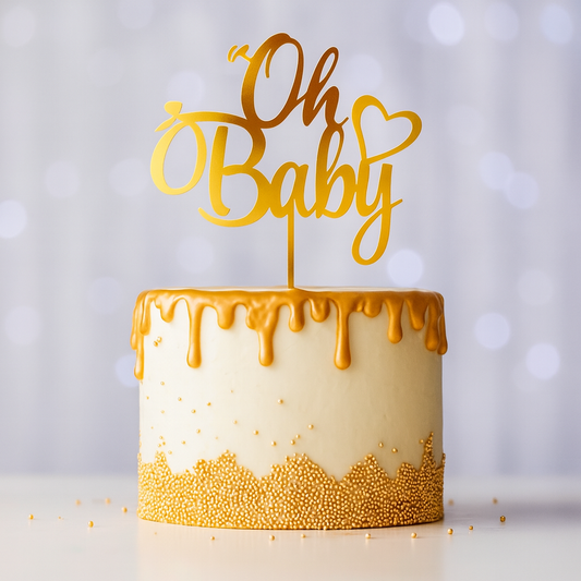 Oh Baby" Acrylic Cake Topper Gold on white cake with gold drip and gold sprinkles for baby celebrations
