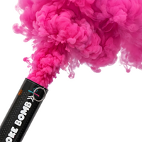 Gender reveal smoke bombs in pink and blue colors